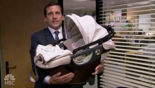 Michael holding the Orbit Baby carrier